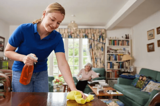 Professional cleaning a bright living room